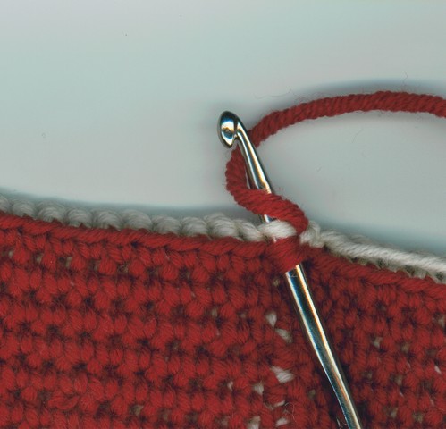 maille serrée réversible, 1er rang